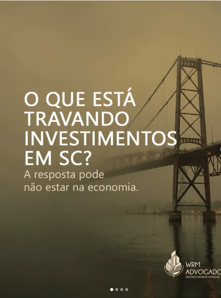 Ponte Hercílio Luz ao entardecer, ilustrando o post "O que está travando investimentos em SC?"